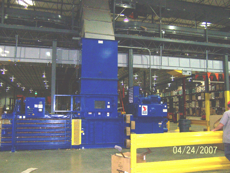 A large warehouse with many blue machines.