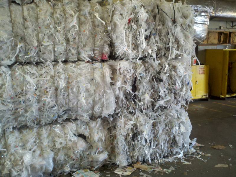 A pile of white yarn in a warehouse.