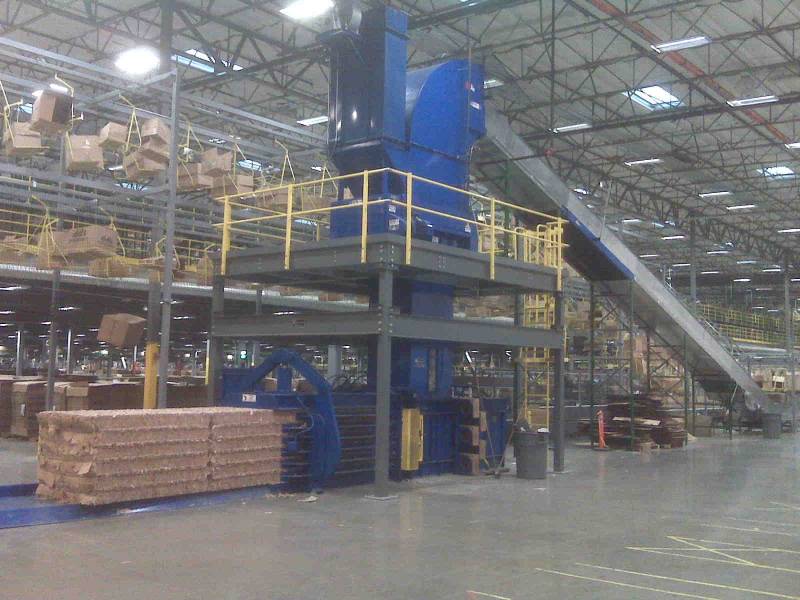 A large warehouse with many stacks of bricks.